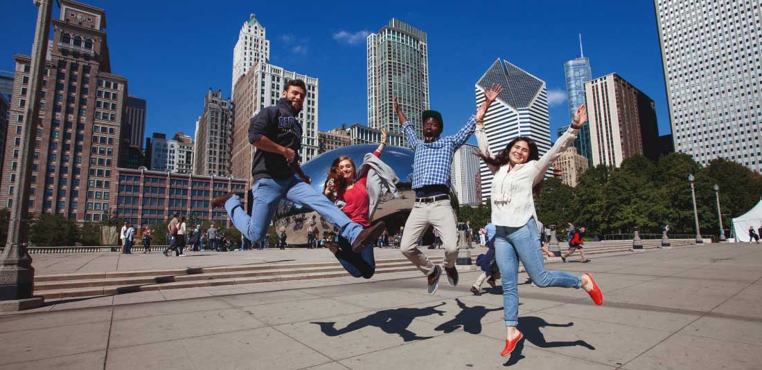 Students jump in excitement in Chicago's Millennium Park 