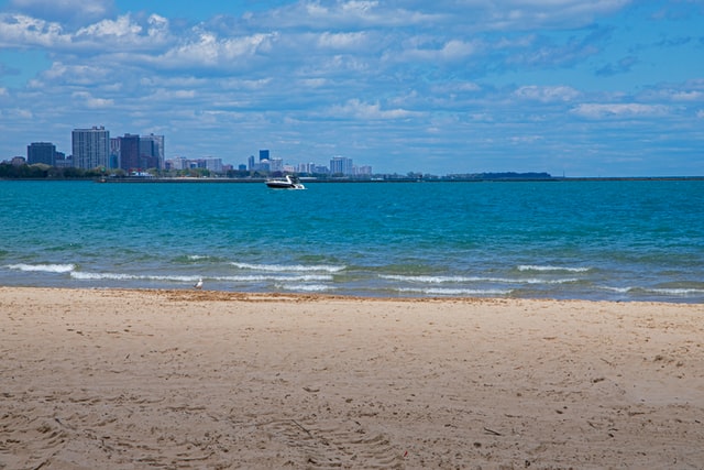 A beautiful sandy beach and the blue water of Lake Michigan 